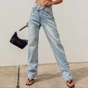 Princess Polly asymmetrical criss cross Jeans